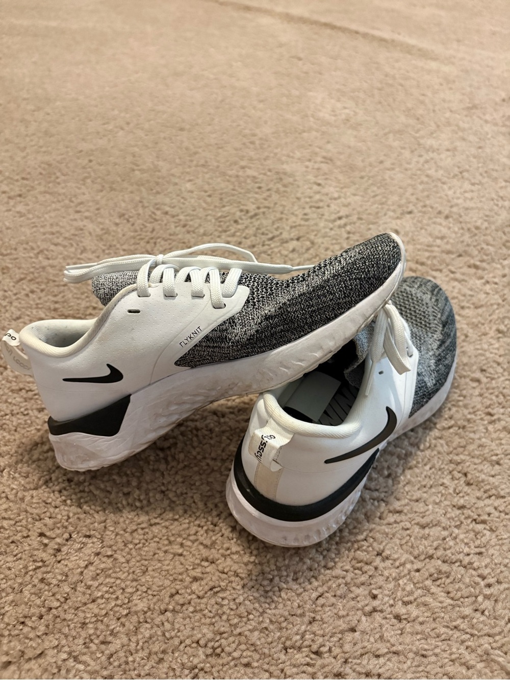 Nike Womens White and Gray Knit running Sneakers with Black Swoosh
